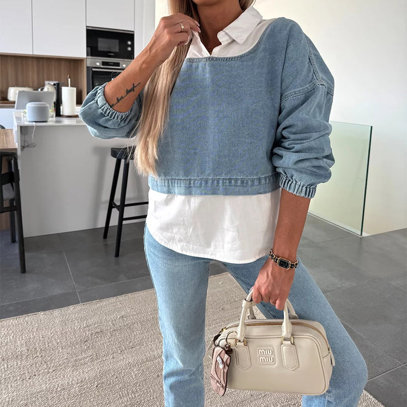 Modische zweiteilige Set bestehend aus einer langärmeligen Jeansbluse und einer Hose für Frauen