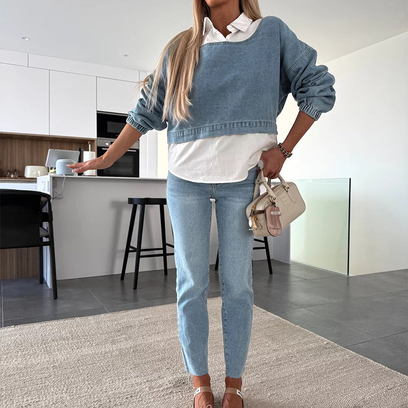 Modische zweiteilige Set bestehend aus einer langärmeligen Jeansbluse und einer Hose für Frauen